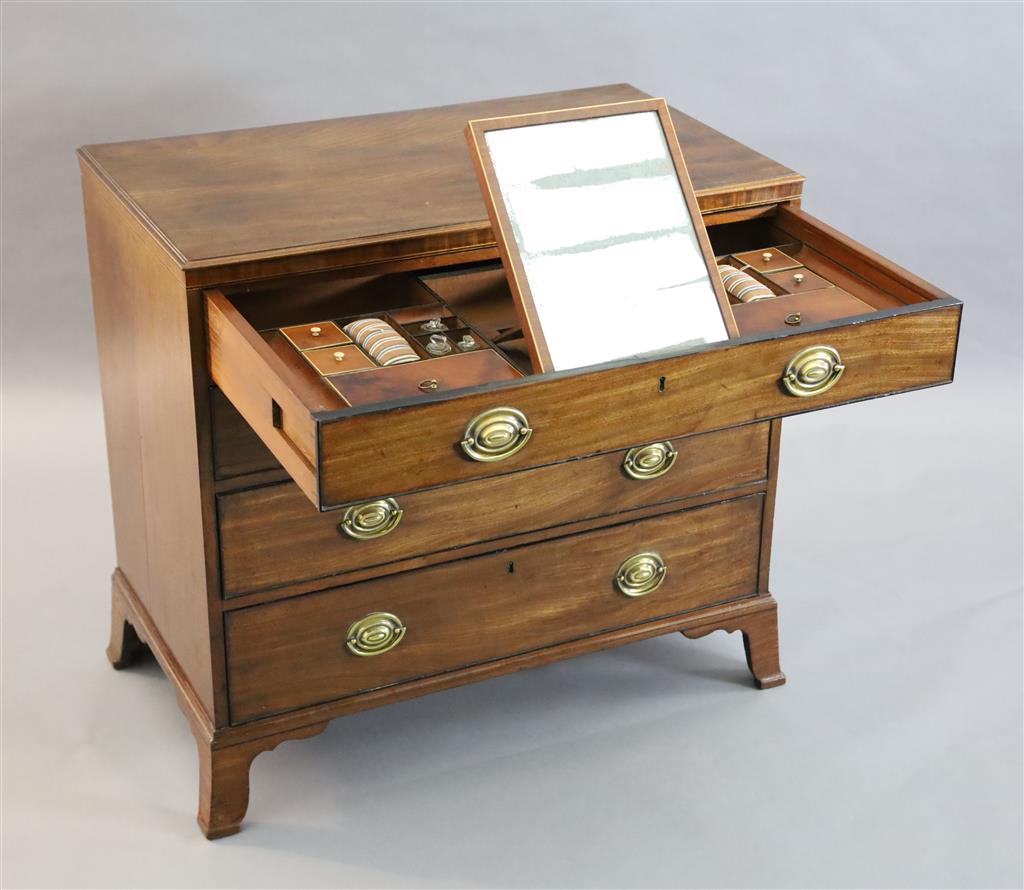 A George III mahogany dressing chest, W.3ft 1in. D.1ft 9in. H.2ft 10in.
